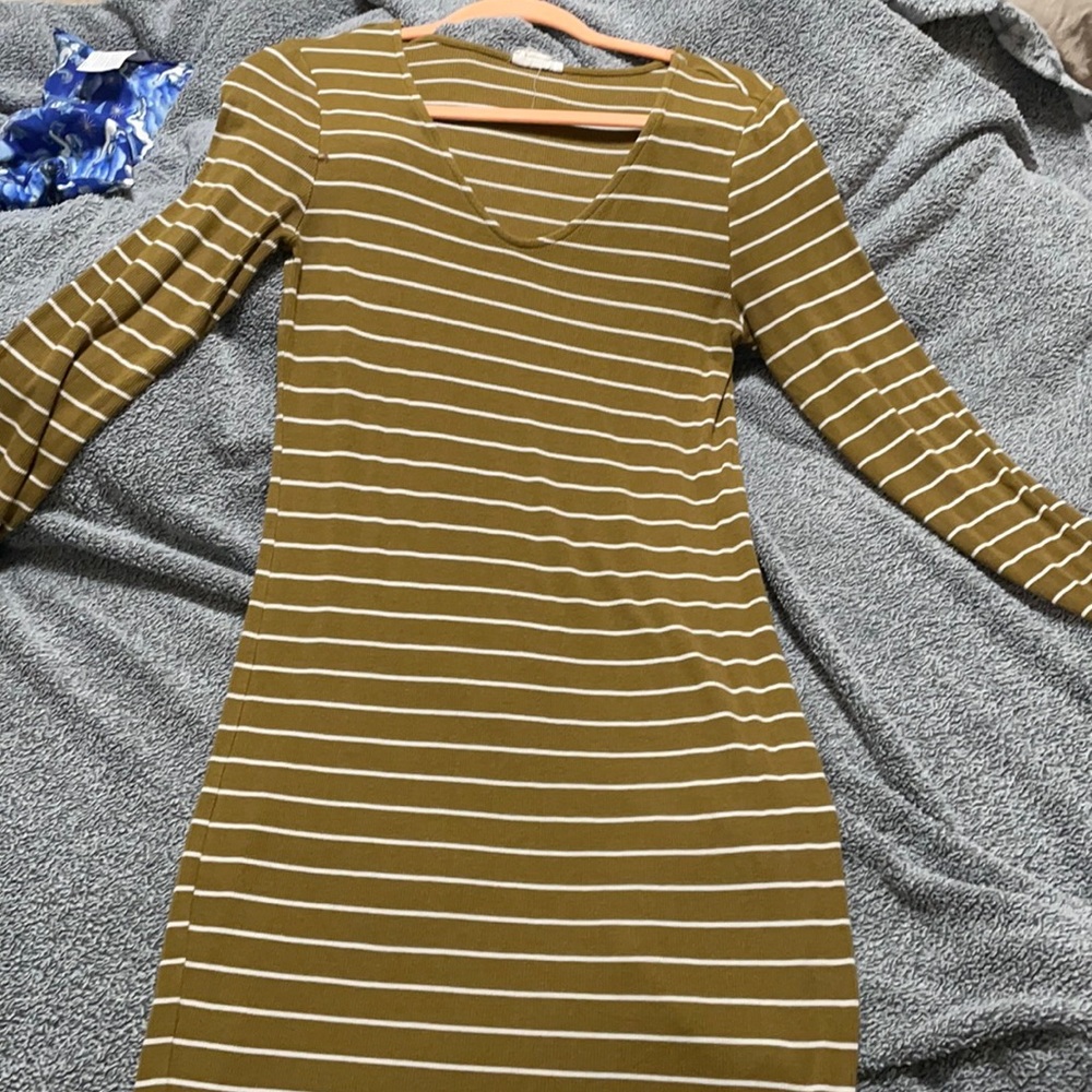 Body hugging maternity dress turned normal everyday midi dress.